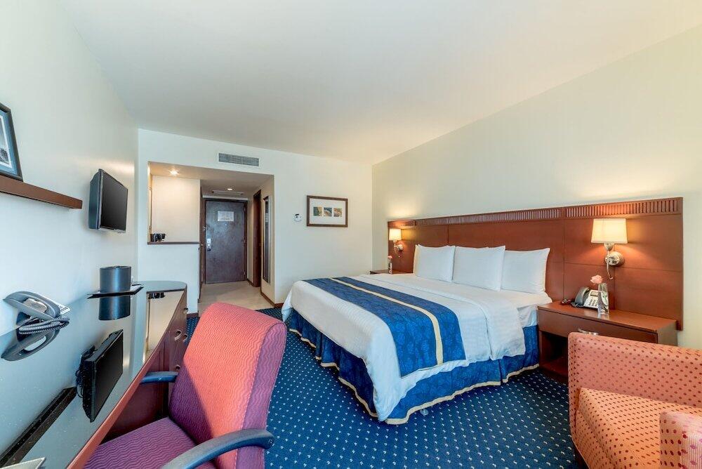 Foto del baño de Hotel Hodelpa Garden Court