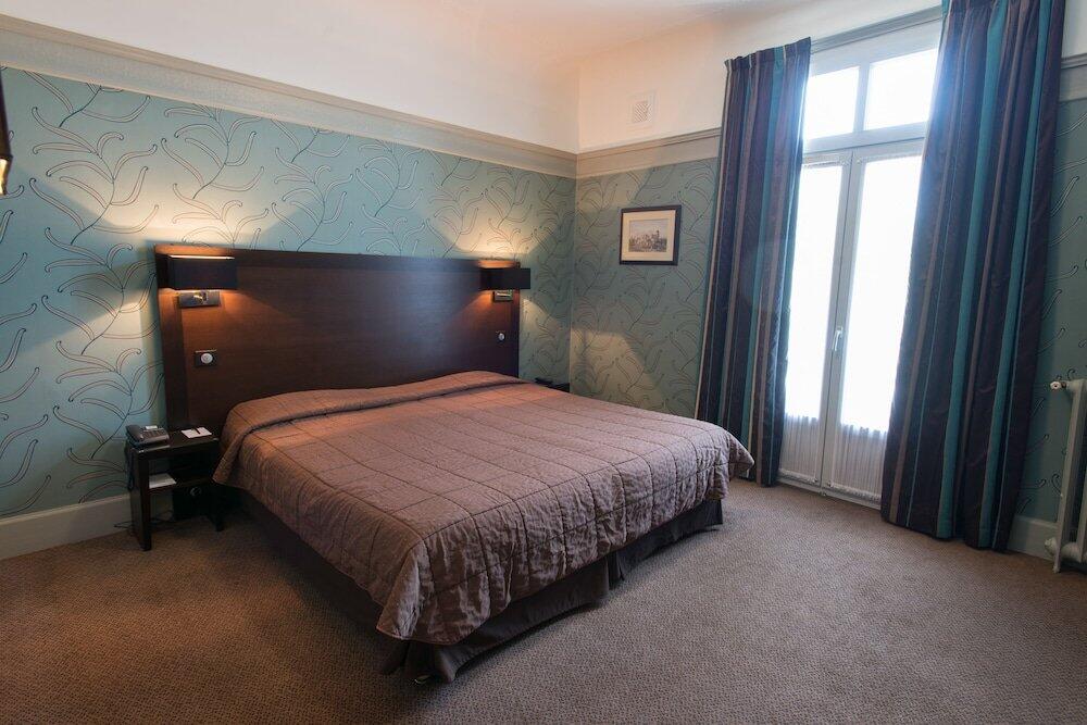 Foto de una habitación de Le Grand Hotel