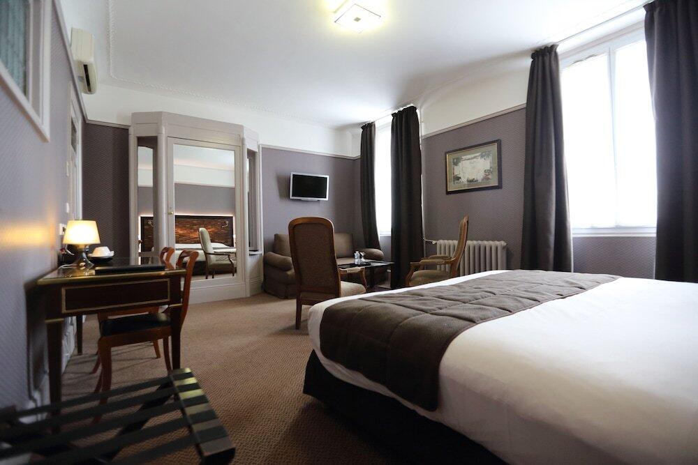 Foto de una habitación de Le Grand Hotel