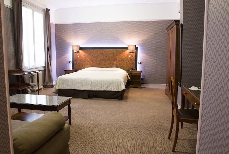 Foto de una habitación de Le Grand Hotel