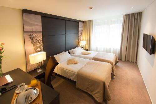 Foto de una habitación de Amberton Hotel Klaipeda
