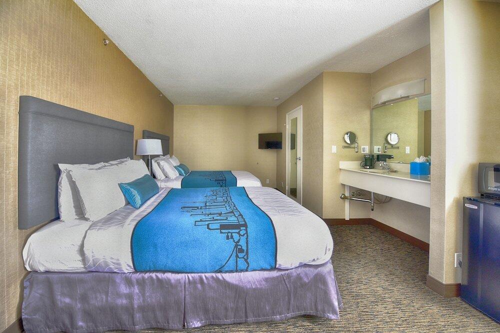 Foto de una habitación de Hotel City Center Inn &amp;amp; Suites