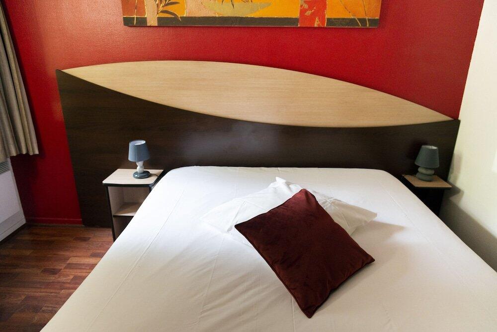 Foto de una habitación de Hôtel Bagatelle Paris Nord Roissy - ex Inter-Hotel