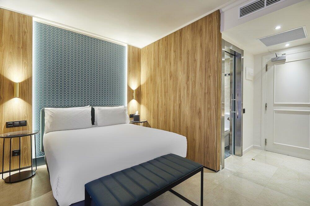 Foto de una habitación de Hotel Exe Mitre