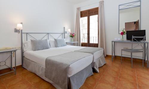 Foto de una habitación de Hotel Toledo Imperial