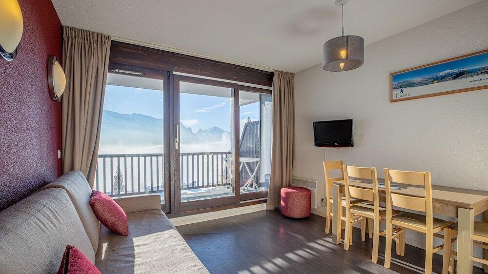 Foto de una habitación de Aparthotel Madame Vacances Les Terrasses De Véret
