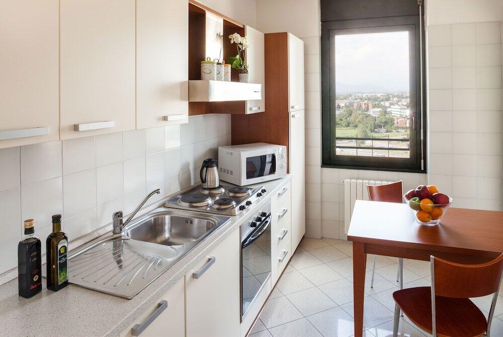 Foto de una habitación de Cosmo Hotel Torri