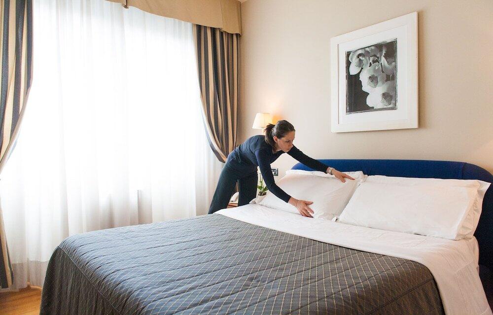 Foto de una habitación de Cosmo Hotel Torri