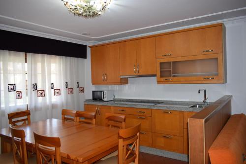 Foto de una habitación de Apartamentos VIDA Corcubión