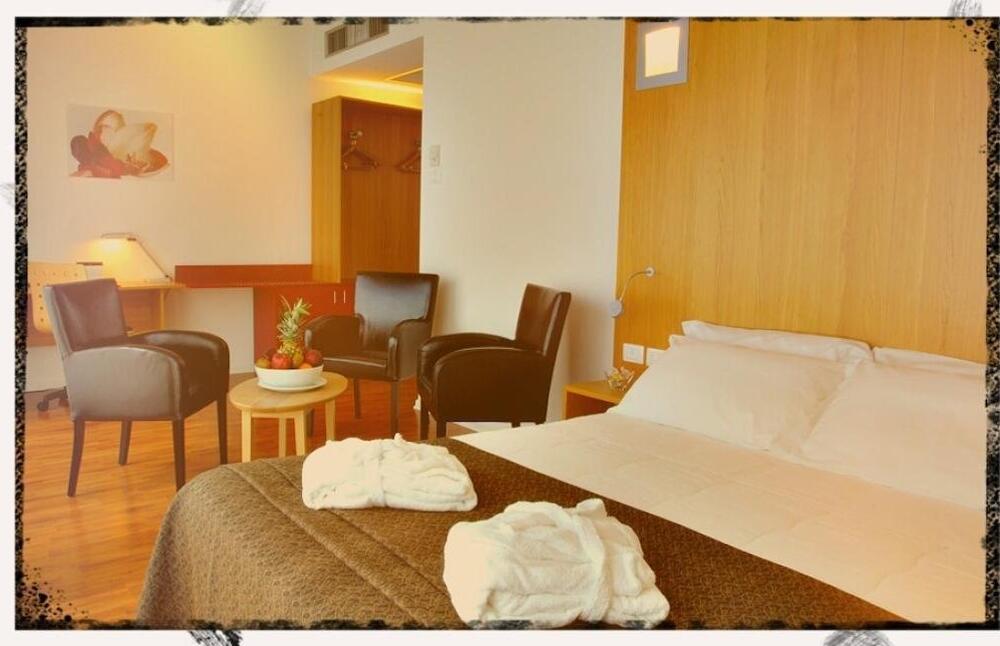 Foto de una habitación de Executive Hotel