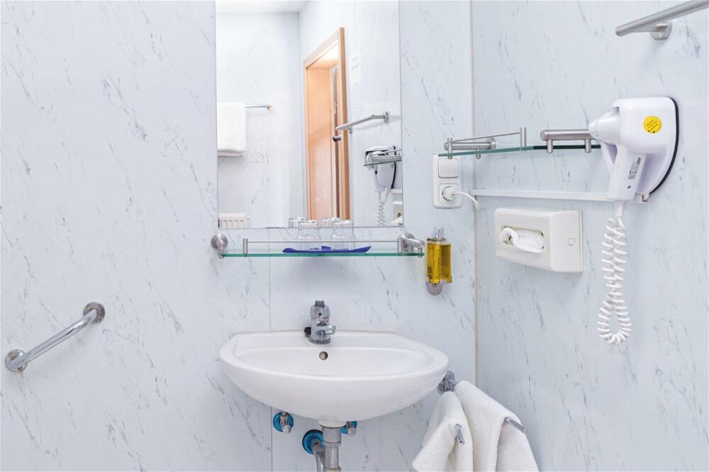 Foto del baño de Hotel Plöner See by Tulip Inn