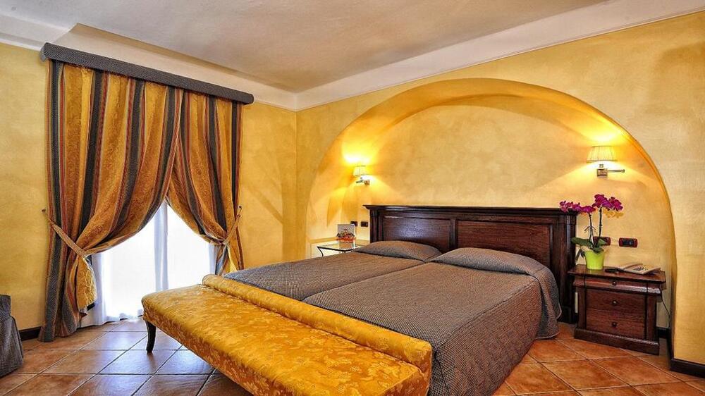 Foto de una habitación de Hotel Arbatasar