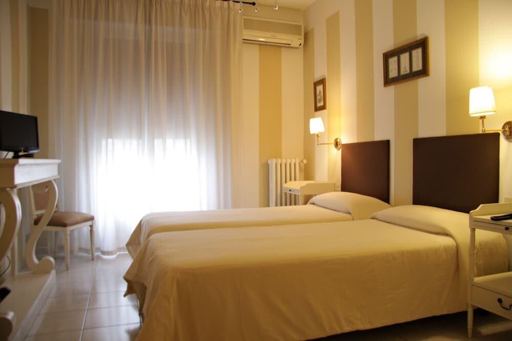 Foto de una habitación de Hotel Alex