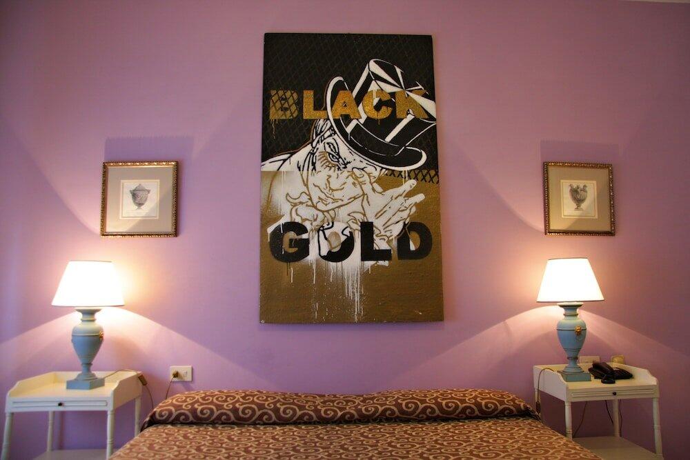 Foto de una habitación de Hotel Alex