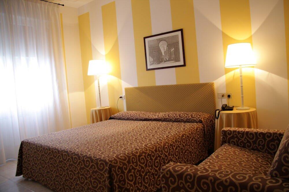 Foto de una habitación de Hotel Alex