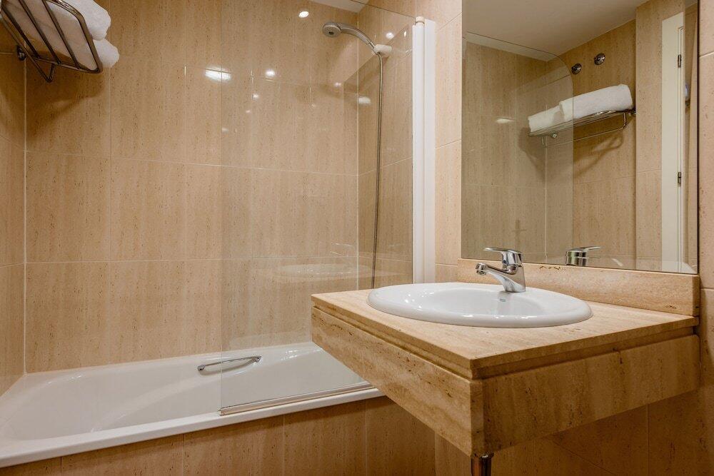 Foto del baño de Hotel Ikonik Plaza Mercado