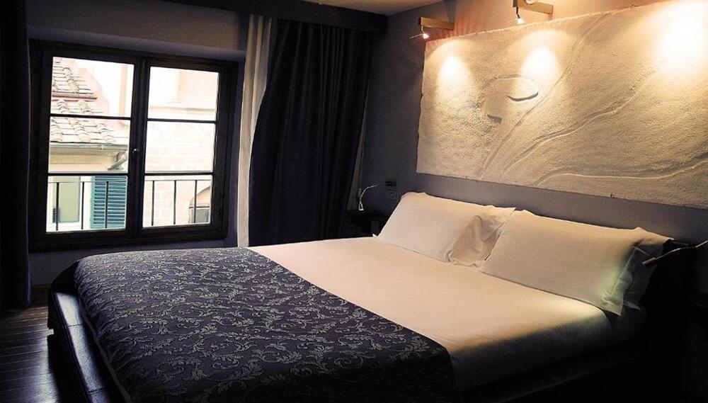 Foto de una habitación de Borghese Palace Art Hotel