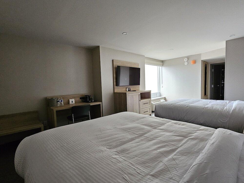 Foto de una habitación de Vittoria Hotel &amp;amp; Suites