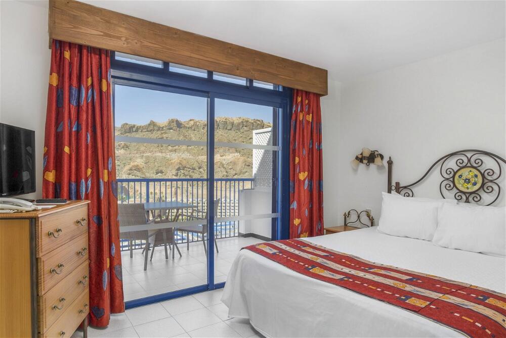 Foto de una habitación de Aparthotel Club Cala Blanca