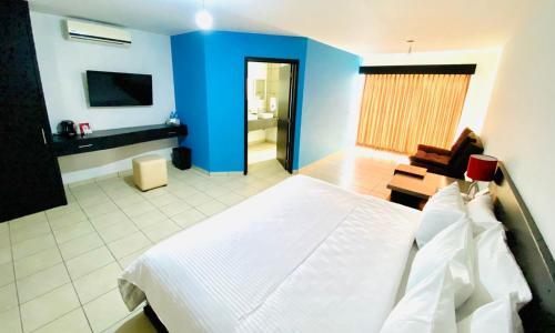 Foto de una habitación de Suites del Real