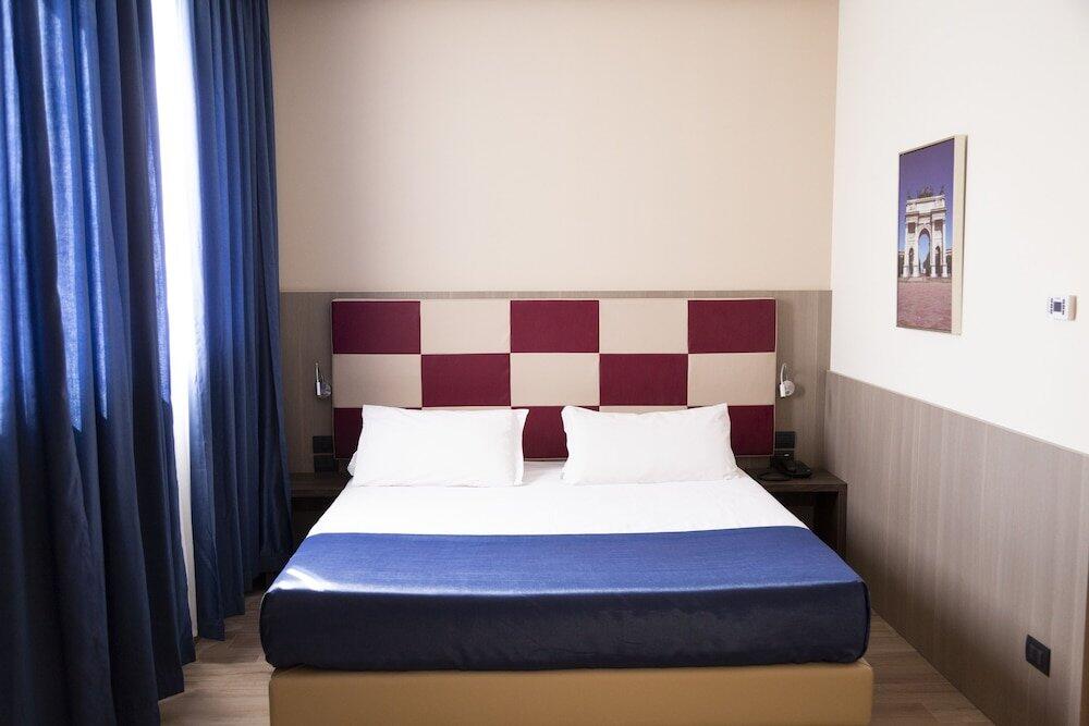 Foto de una habitación de iH Hotels Milano St. John