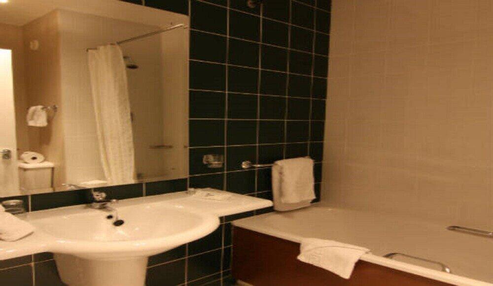 Foto del baño de City Hotel