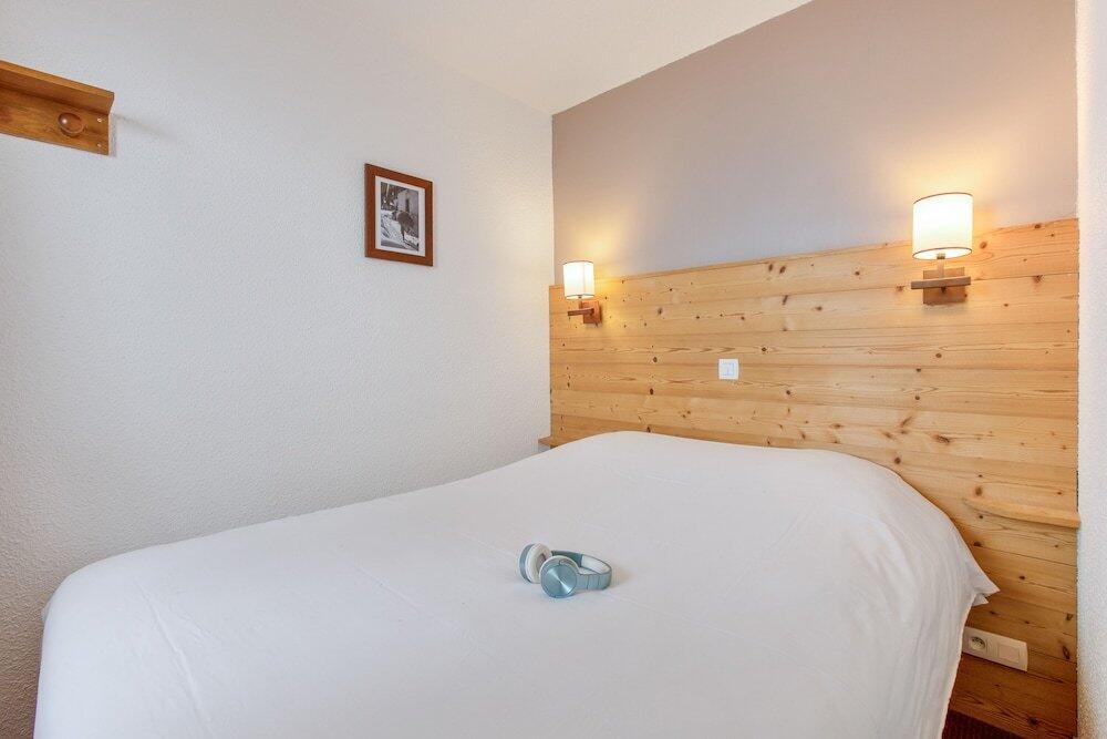 Foto de una habitación de Aparthotel Pierre &amp;amp; Vacances Residence Les Sentiers du Tueda