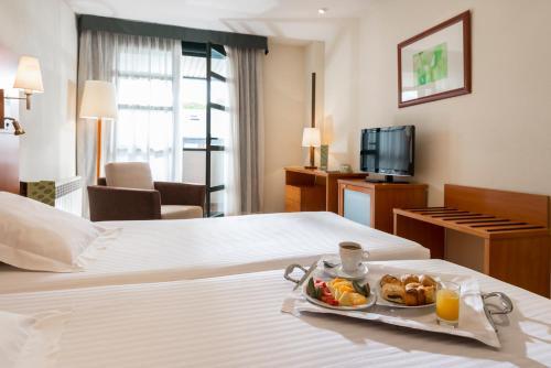 Foto de una habitación de Exe Gran Hotel Almenar