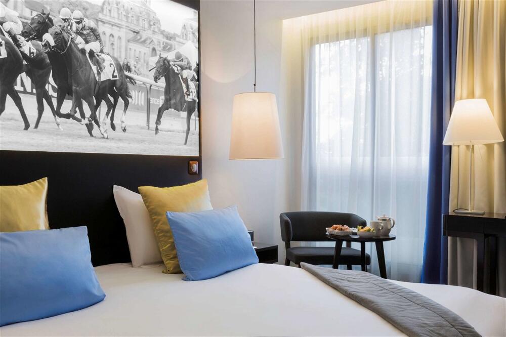 Foto de una habitación de Best Western Plus Hotel Du Parc Chantilly