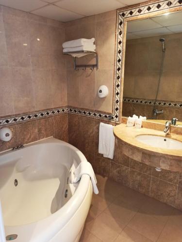 Foto del baño de Hotel Aromar