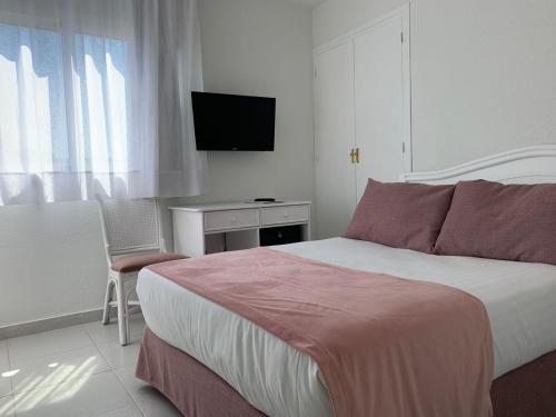 Foto de una habitación de Hotel Aromar