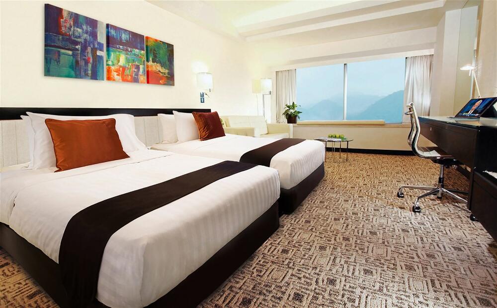 Foto de una habitación de Regal Riverside Hotel