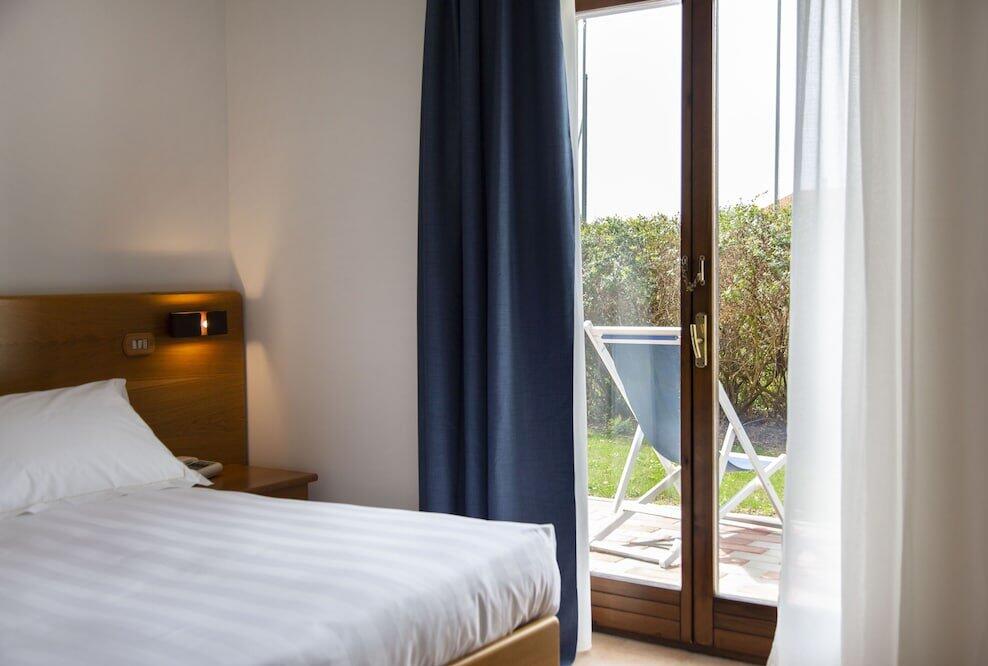 Foto de una habitación de Hotel Villa Paradiso