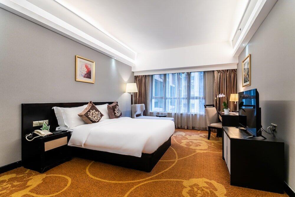 Foto de una habitación de Landmark International Hotel