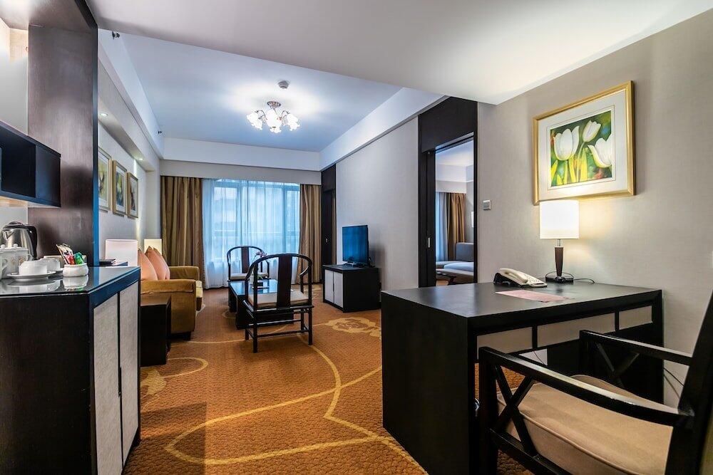 Foto de una habitación de Landmark International Hotel