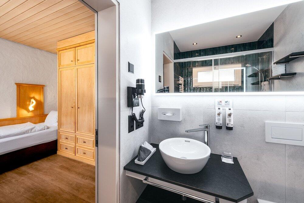 Foto del baño de Hotel Kreuz&amp;amp;Post**** Grindelwald