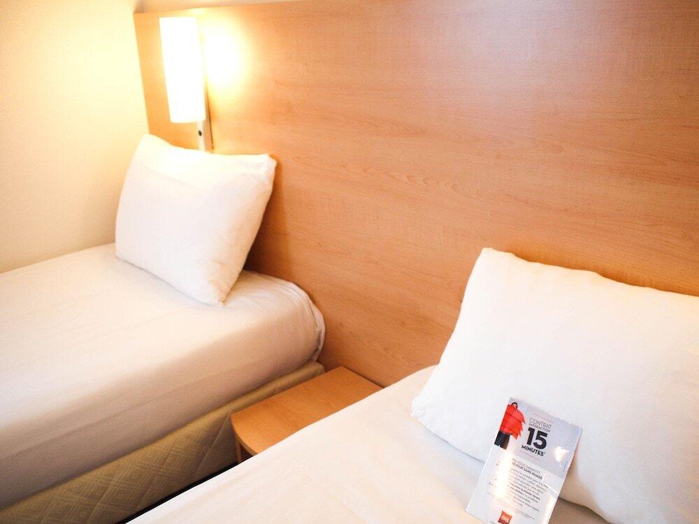 Foto de una habitación de Hotel ibis Bordeaux Saint Emilion