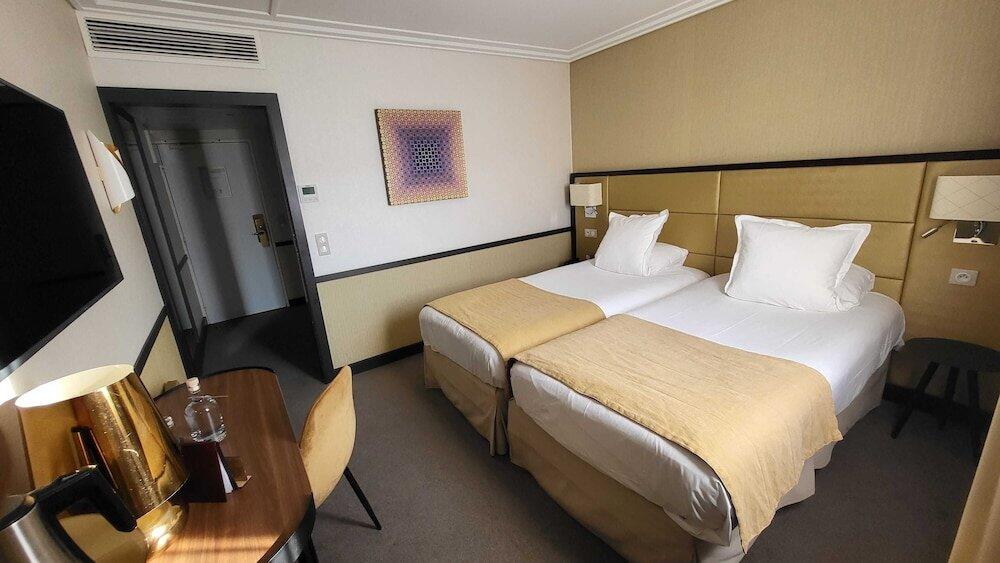Foto de una habitación de Hotel Paris Neuilly