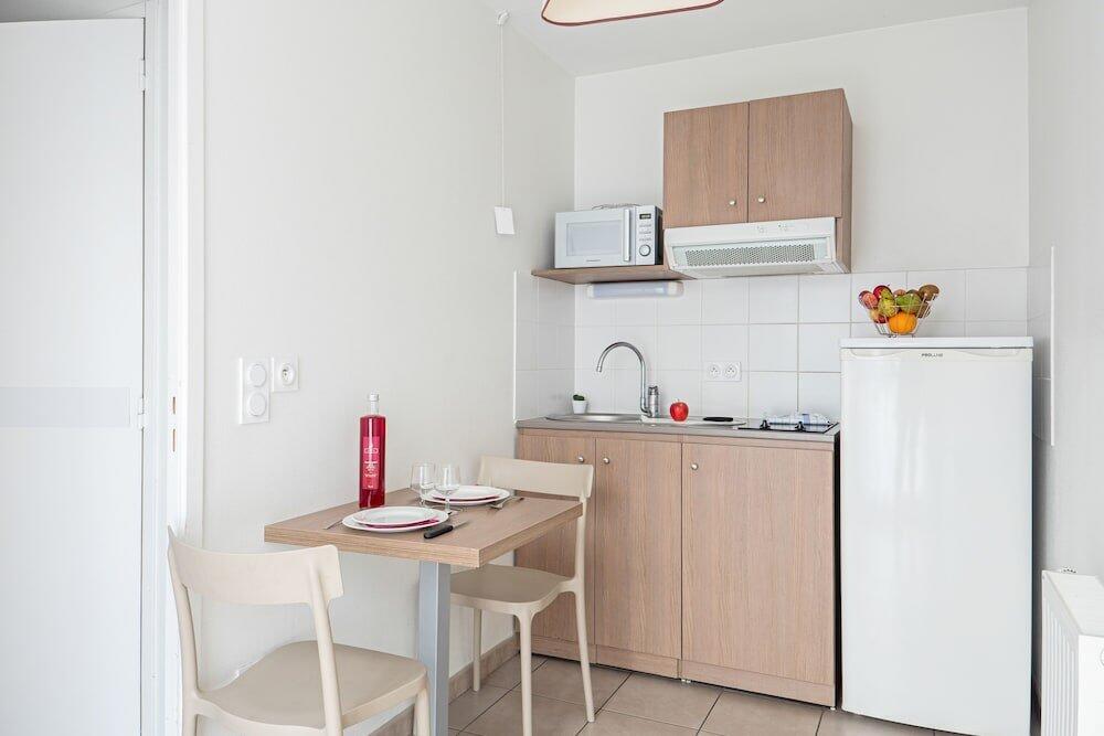 Foto de una habitación de Appart&amp;#039;City Confort Orléans