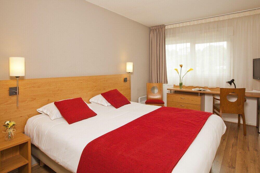 Foto de una habitación de Aparthotel Séjours &amp;amp; Affaires Poitiers Lamartine