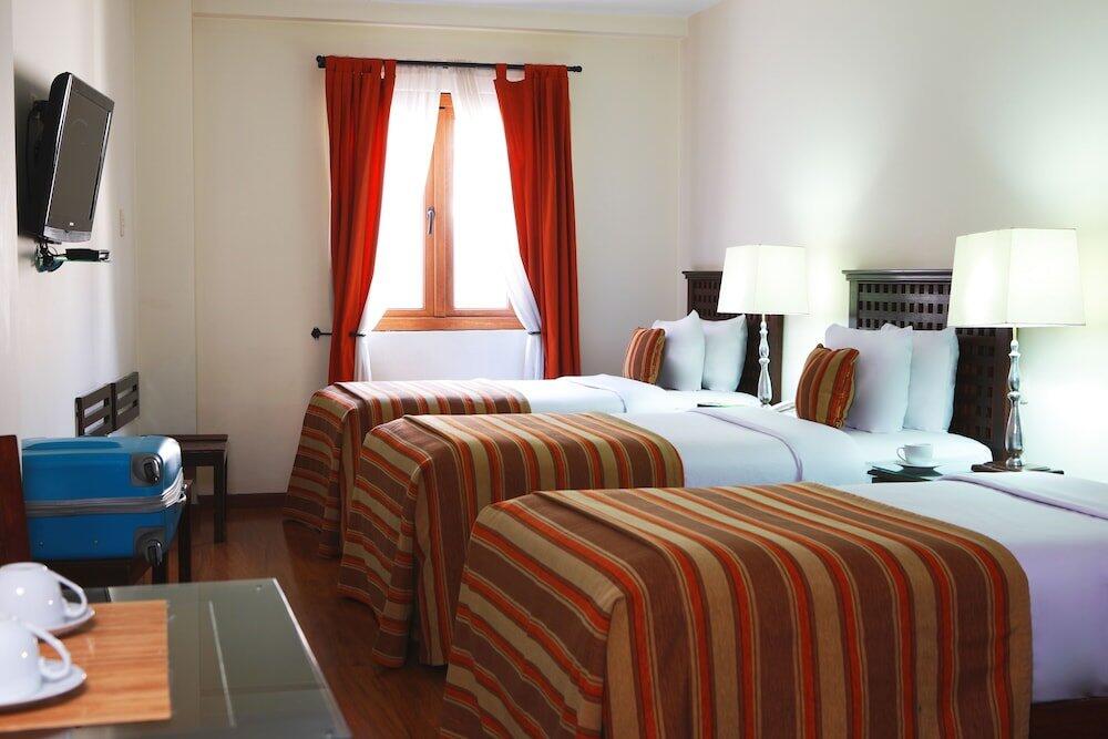 Foto de una habitación de Hotel San Agustin El Dorado
