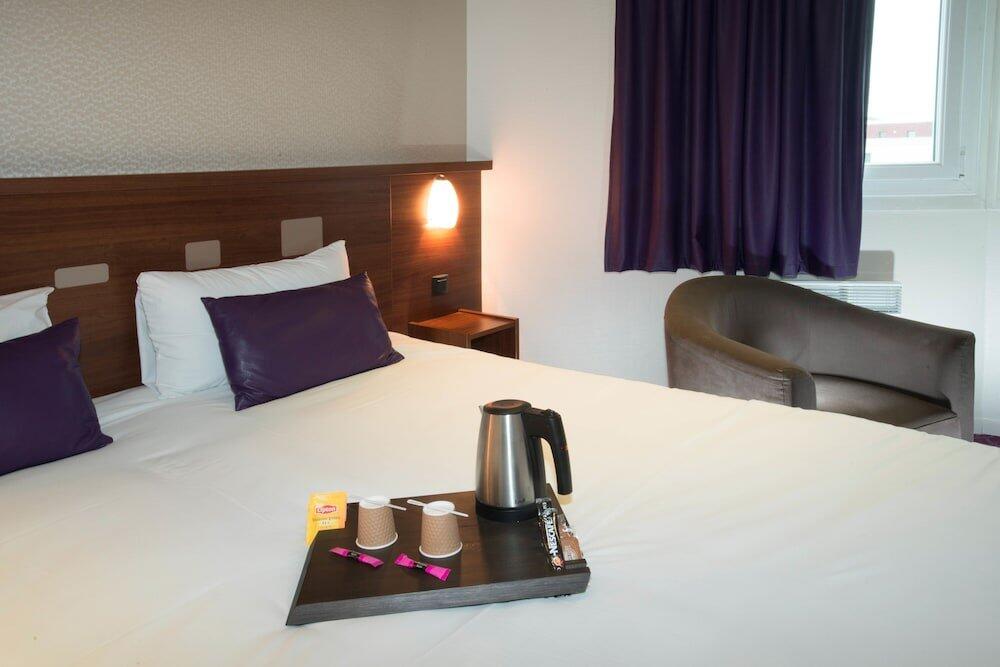 Foto de una habitación de Brit Hotel Tours Sud – Le Cheops