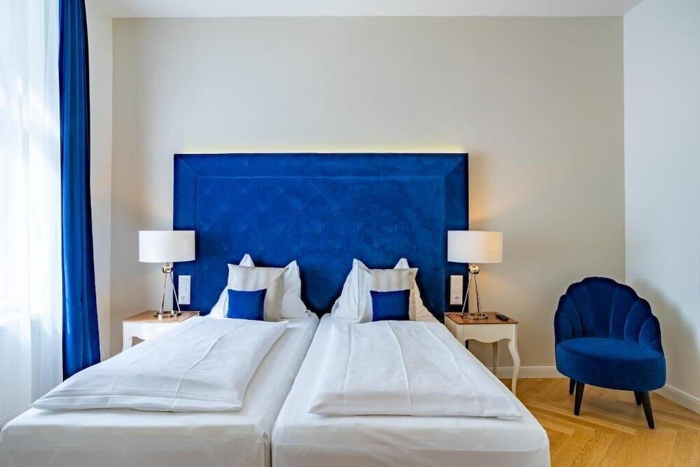 Foto de una habitación de Theaterhotel &amp;amp; Suites Wien