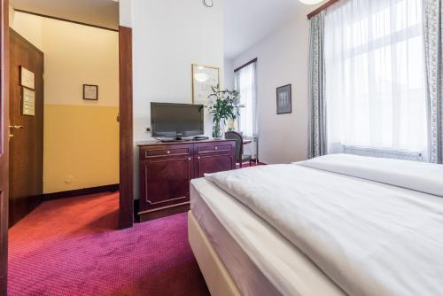 Foto de una habitación de Theaterhotel &amp;amp; Suites Wien