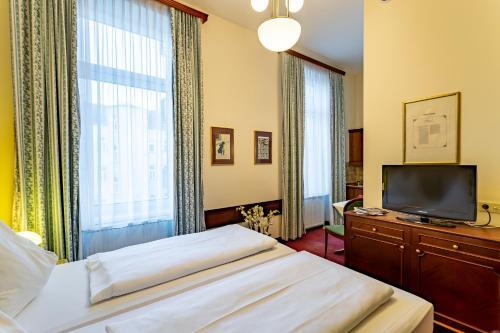Foto de una habitación de Theaterhotel &amp;amp; Suites Wien