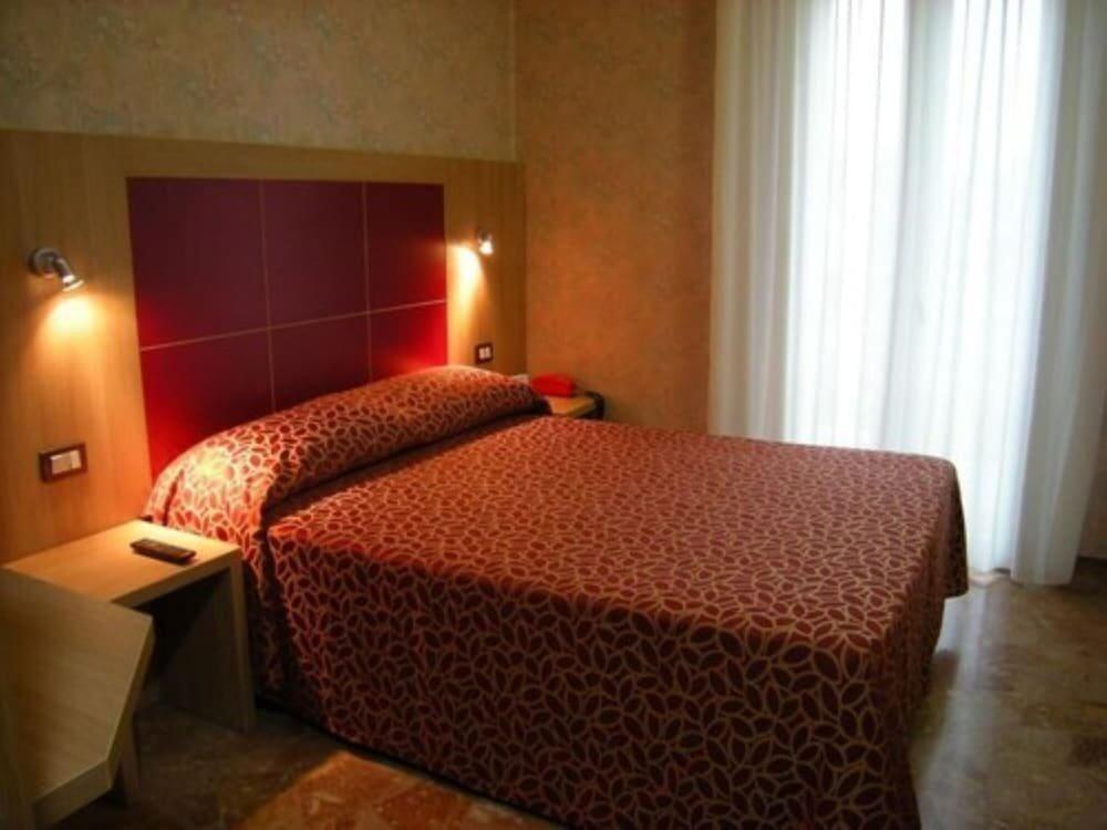 Foto de una habitación de Hotel San Carlo