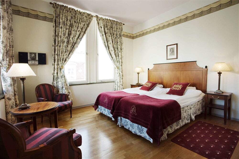 Foto de una habitación de First Hotel Statt