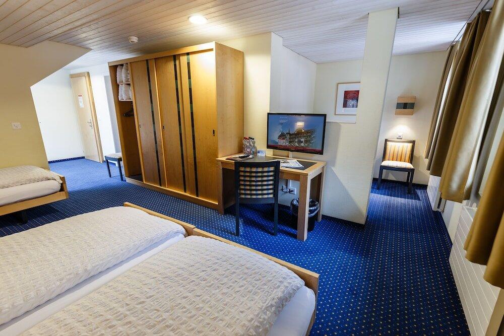 Foto de una habitación de Hotel Arenas Resort Victoria-Lauberhorn