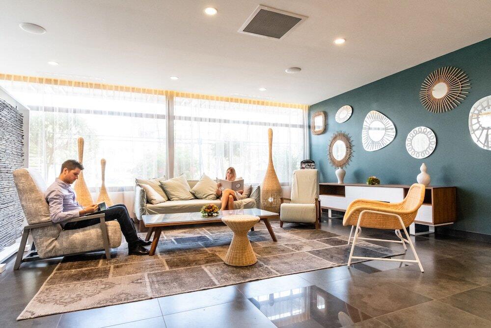 Foto de las zonas nobles de Aparthotel Les Loges du Park