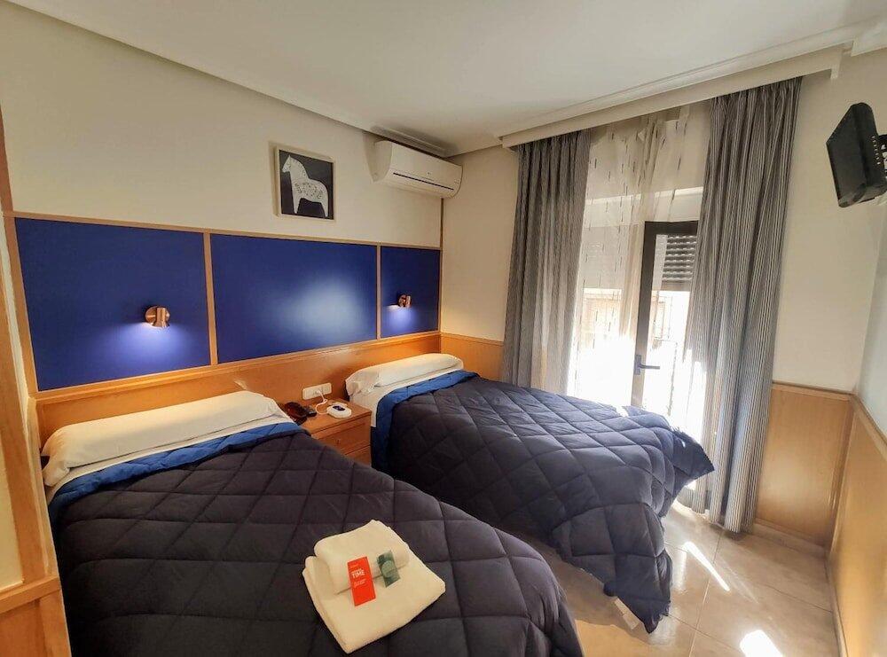 Foto de una habitación de Trípolis Toledo